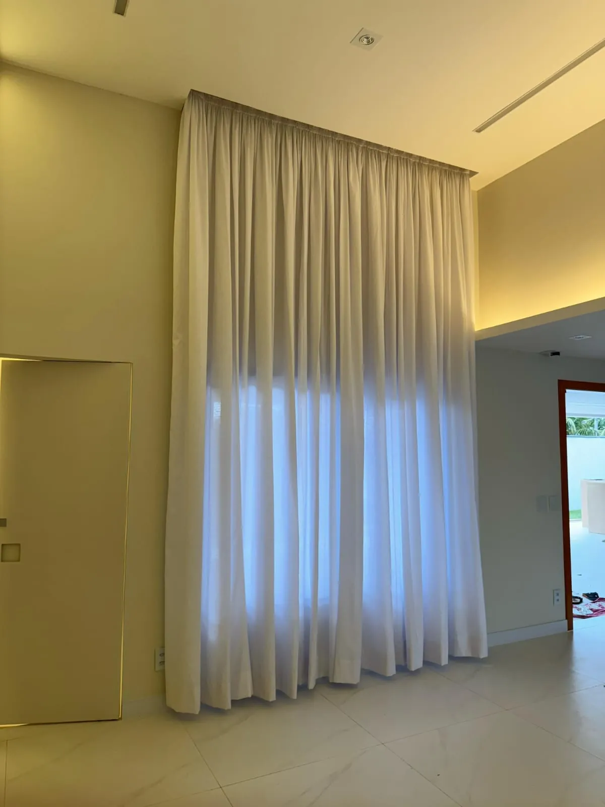 Cortina franzida em casa de cliente